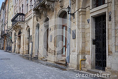 Empty old city street,city without people, streets of old Lviv during quarantine, all restaurants and cafes closed Editorial Stock Photo