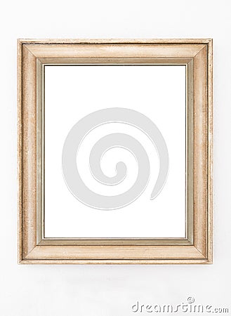 Empty ornate picture frame hanging on wall Stock Photo