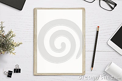 Empty paper mockup, on old folder, white wooden work desk Stock Photo