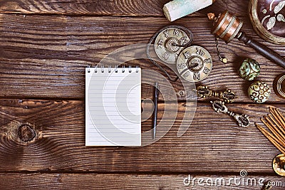 Empty paper notebook and Tibetan religious musical instruments Stock Photo