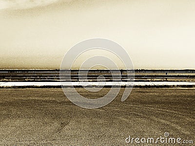 Empty parking with guardrail, grainy sepia hue Stock Photo