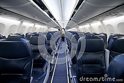 Empty passenger airplane seats in the cabin of plane Stock Photo