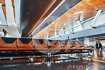 Empty passenger seats in international airport Stock Photo