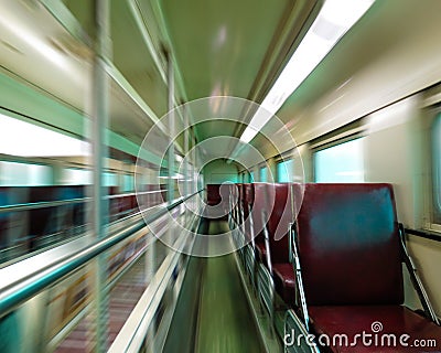Empty passenger train car with motion blur Stock Photo