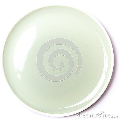 Empty pastel green plate on white background Stock Photo