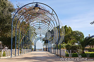 Empty pedestrian walkway with arch. Santa Pola Stock Photo