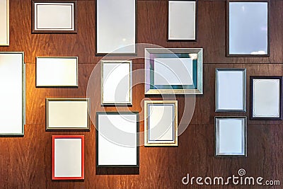 Blank picture frames on a wall gallery Stock Photo