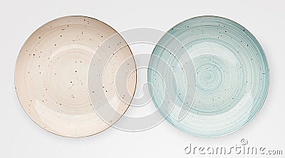 Empty pink ceramic plates isolated Stock Photo