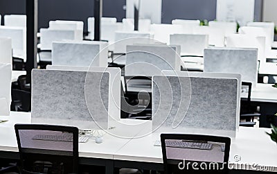 Empty places for workers in big empty rental office Stock Photo