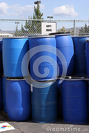 Empty plastic drums for chemicals at a recycling location Stock Photo