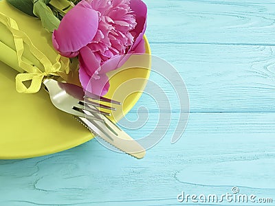 Empty plate flower peony design birthday romantic on blue wooden background Stock Photo