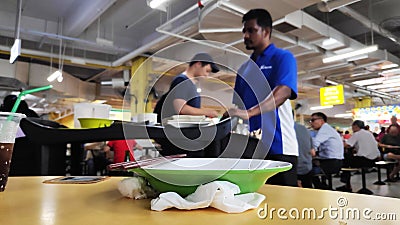 Empty plate on the table in a hawker center Editorial Stock Photo