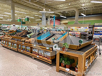 Empty produce department shelves at a Publix grocery store due to the people panicing and hoarding paper and food products Editorial Stock Photo