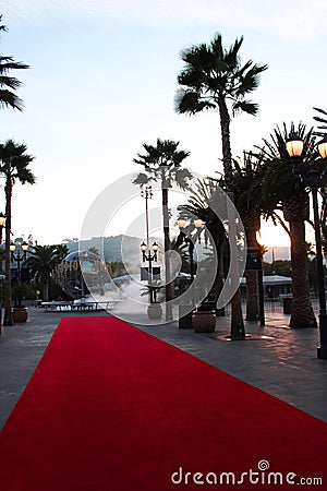 An empty Red carpet at the main entrance of Universal Studio overlooking the famous Universal Studio symbol. Editorial Stock Photo