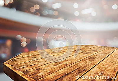 Empty retro wood table top with blurred restaurant kitchen design Stock Photo