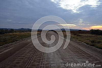 Empty road at dawn Stock Photo