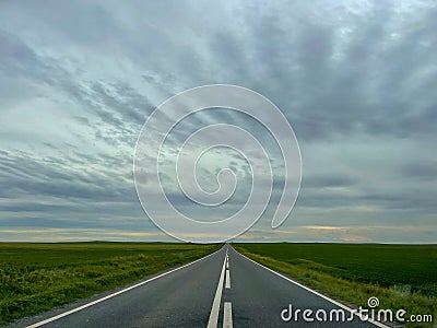 Empty road in Dobrogea with blue sky Stock Photo