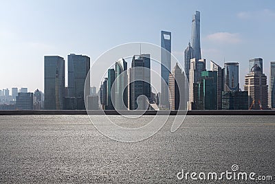 Empty road surface floor with city landmark buildings of Shanghai Skyline Editorial Stock Photo