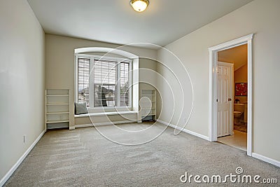 Empty room with arch window and bench Stock Photo