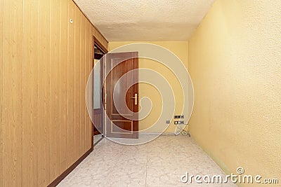 Empty room with ceramic stoneware floor and walls painted in light Stock Photo