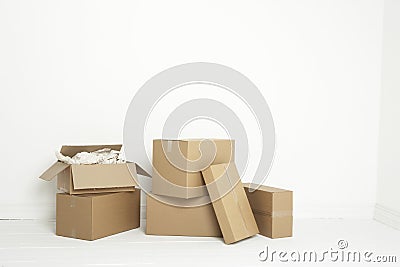 Empty room with moving boxes Stock Photo