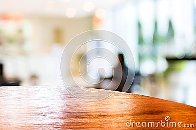 Empty round table top at coffee shop blurred background with bokeh light,Template mock up for display of your product. Stock Photo