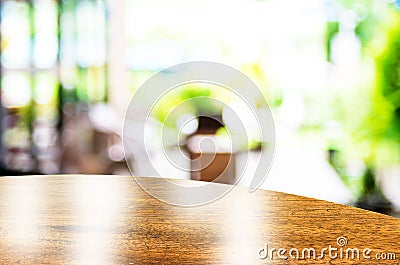 Empty round table top at coffee shop blurred background with bokeh light,Template mock up for display of your product. Stock Photo