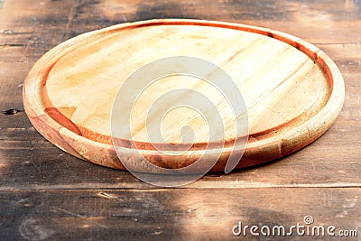 empty round wooden board ideal for placing plates and food montages Stock Photo