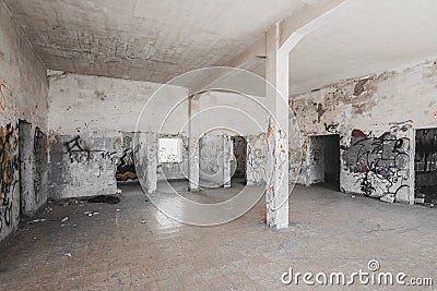 Empty run down room inside abandoned building ruin Stock Photo