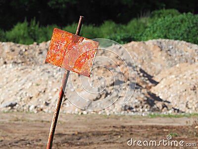 Empty rusty sign with soft soil in background Stock Photo