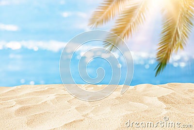 Empty sand beach in front of summer sea and palm tree background with copy space Stock Photo