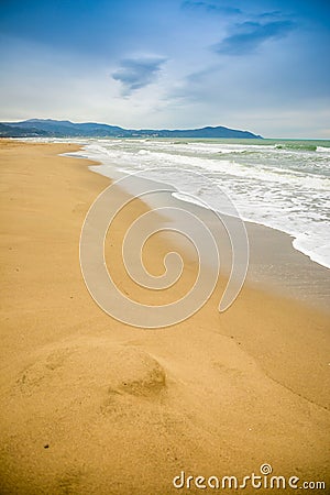 Empty sand beach in Paestum in cloudy day in winter, Cilento, Italy Stock Photo