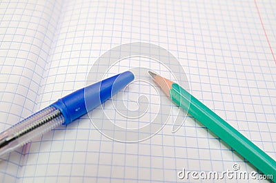 Empty school notebook with pen and pensil Stock Photo