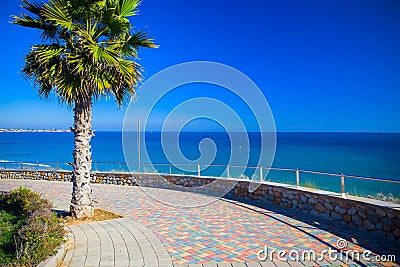 Empty seafront promenade of Pilar de la Horadada spanish town in the Province of Alicante Stock Photo