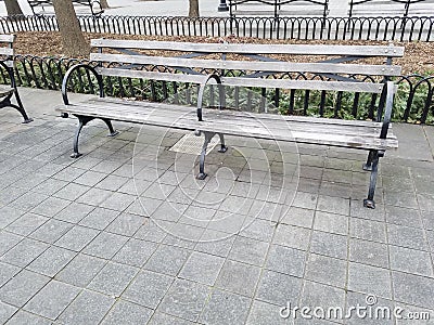 Wooden park bench double seat. Stock Photo