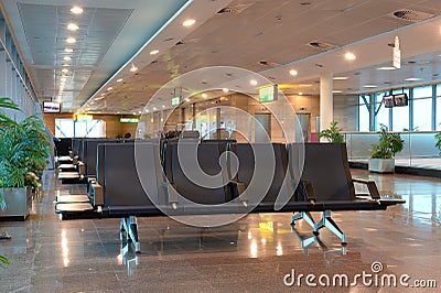 Empty seats in airport waiting area Stock Photo