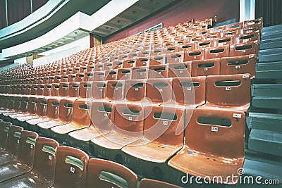 Empty seats in the auditorium. toning. Concept: lack of interest, failure, boycott Stock Photo
