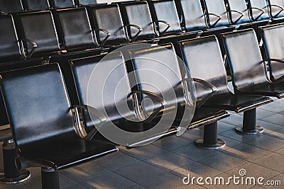 Empty seats in waiting lounge on airport Editorial Stock Photo