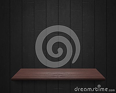 Empty shelf at black wooden wall background Stock Photo