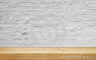 Empty shelf on white brick wall Stock Photo