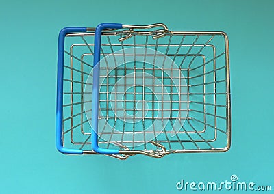 Empty shopping basket on colorful background. Shop trolley at supermarket. Sale, discount, shopaholism, black friday, economy conc Stock Photo