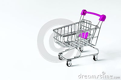 Empty shopping cart on a white background close up Stock Photo
