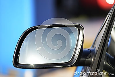 Empty side rearview mirror on a car, concept with copy space Stock Photo