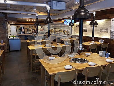 Empty small local restaurant during coronavirus COVID-19 Stock Photo