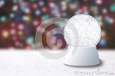 Empty Snow Globe on a Christmas Blurry Background Stock Photo