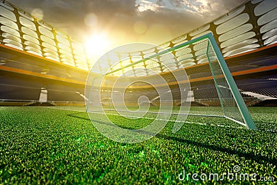 Empty soccer stadium in sunlight Stock Photo