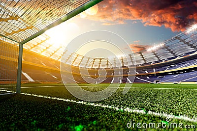 Empty soccer stadium in sunlight Stock Photo