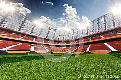 Empty soccer stadium in sunlight Stock Photo