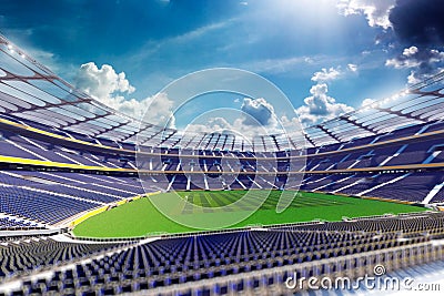 Empty soccer stadium in sunlight Stock Photo