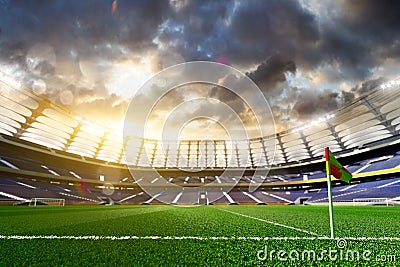 Empty soccer stadium in sunlight Stock Photo